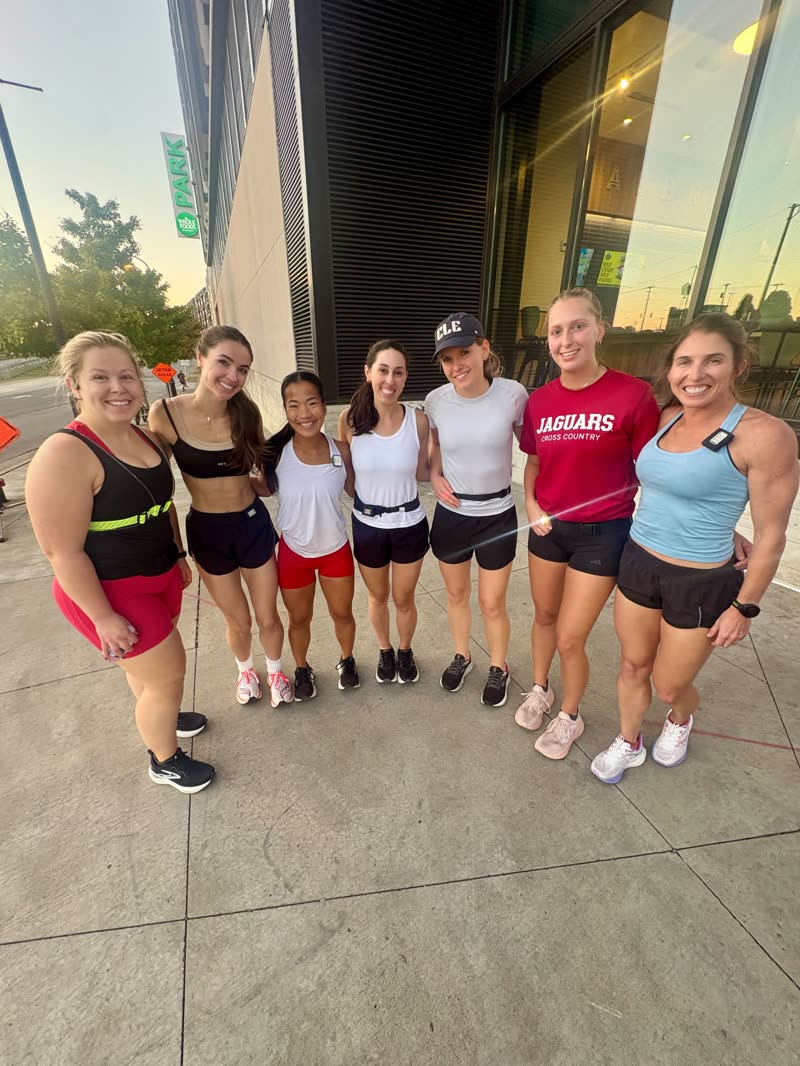 A group of QNTM Run Club members after finishing a run